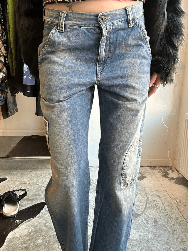 jeans with red embroidery on back pocket