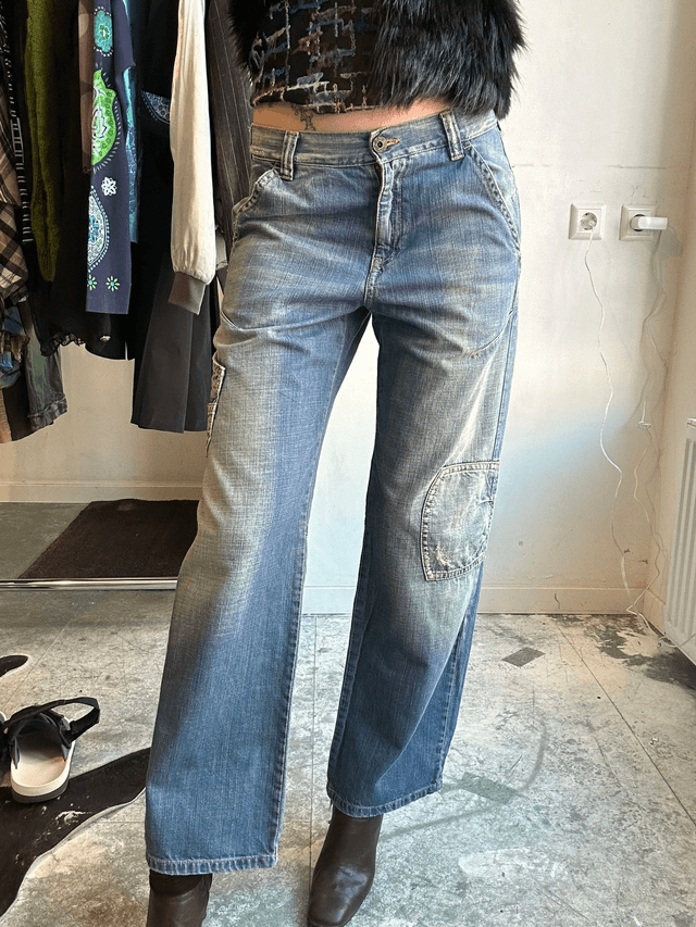 jeans with red embroidery on back pocket