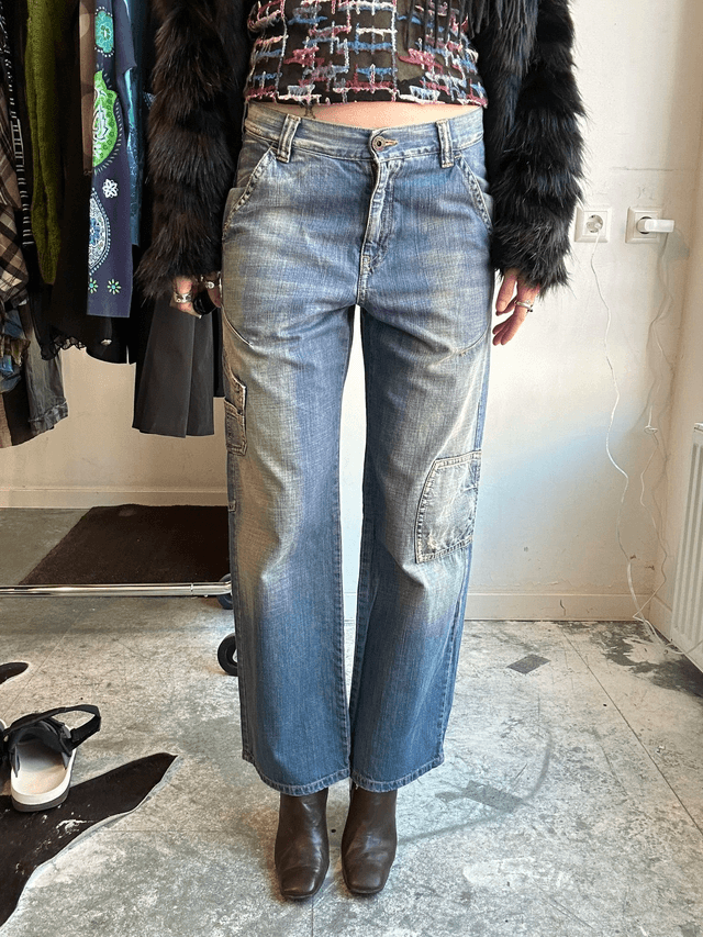 jeans with red embroidery on back pocket